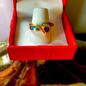 14 it purple tanzanite ring with small diamonds